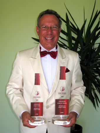 Domenic Mondillo with the Champion Pinot Noir and Champion Wine of Show trophies